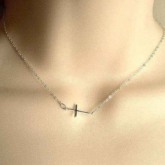 Tiny sideways store cross necklace